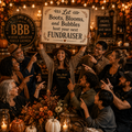 A diverse, intergenerational group smiles and points toward a woman holding a sign that reads, “Let Boots, Blooms, and Bubbles host your next fundraiser.” The warm fall setting features vintage décor, autumn colors, soft café lights, and a welcoming creative gathering atmosphere.